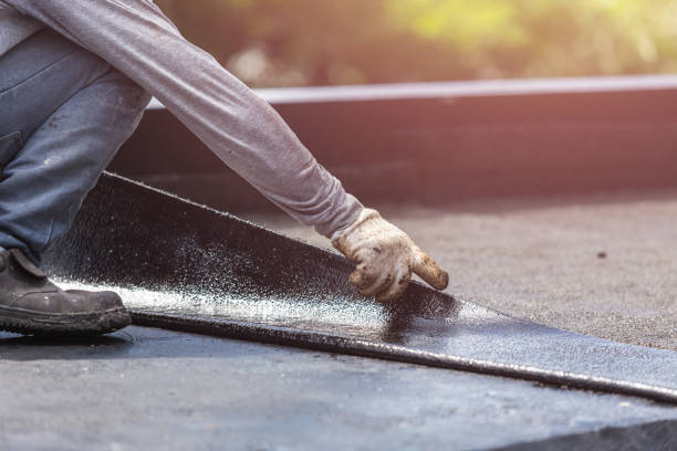Professional Waterproofing technician working in Foster, KY